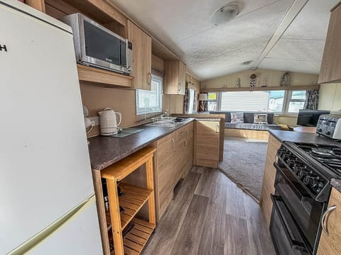 Bright, modern kitchen with ample counter space and natural light