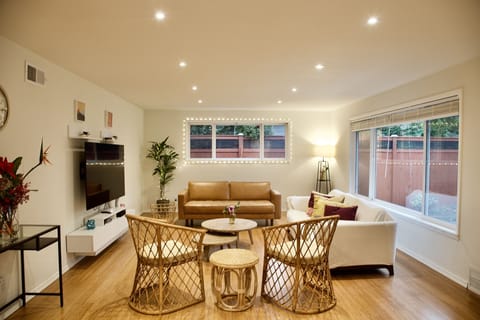 Living room area w/ desk off to the left