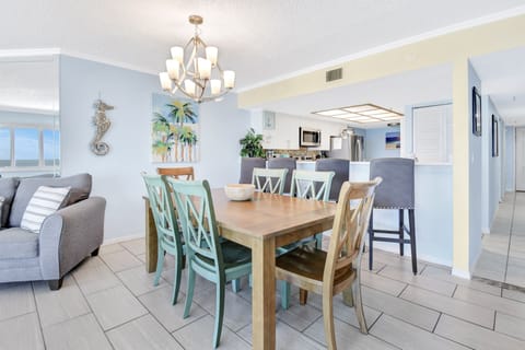 3BR dining table seats 6, 4 hightop chairs and another table for 4 in kitchen.