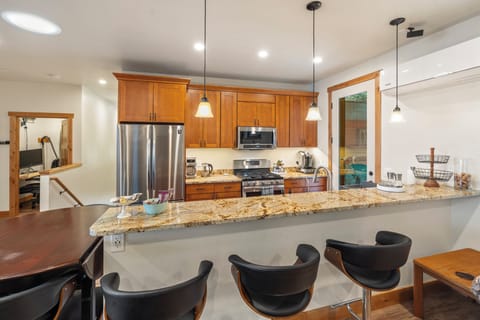 Great place to watch the cook in action. Door out to BBQ deck right off kitchen.