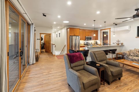 Looking South toward Kitchen, Laundry room, desk, workspace.
