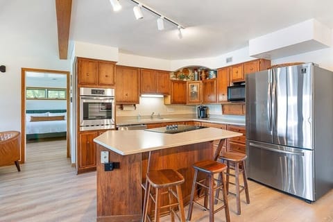 Seating at the island and at the dining table