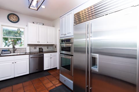 Subzero fridge with built-in water and ice maker.