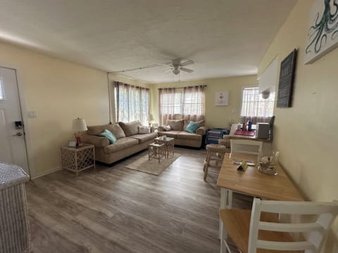 Living room with 3 bar stools 
Roku TV  
Gem is located on 2nd floor