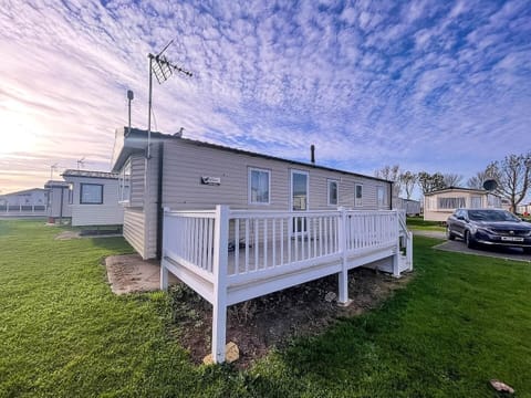 Spend sunny afternoons on the caravan decking, soaking up the coastal atmosphere at Seawick Holiday Park.