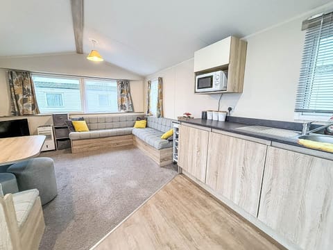 The holiday home living room is a cosy space to relax and recharge after a busy day exploring Clacton-on-Sea.