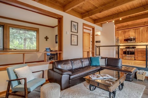 Living room view with office privacy doors open