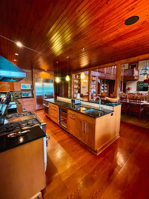 The chef's kitchen is fully stocked for gourmet cooking or easy warm-ups. 