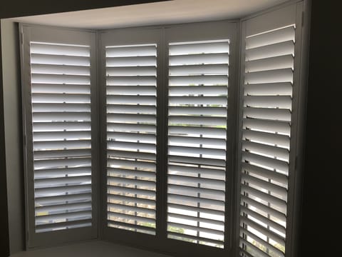 Plantation Shutters keeps room quiet & dark for restful sleep.