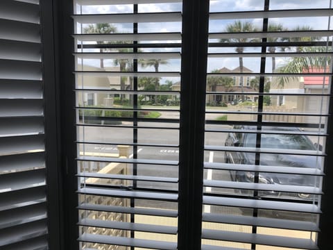 New Plantation Shutter Blinds keeps light out for a restful night of sleep. 