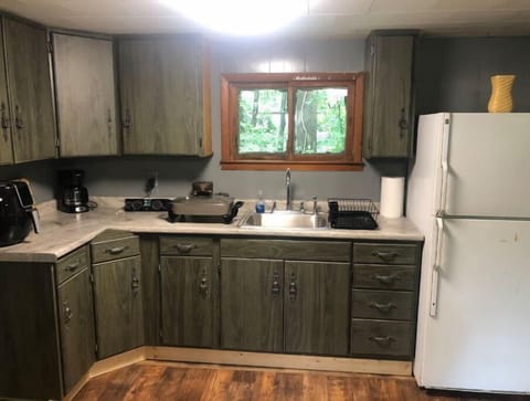 Kitchen with plenty of refrigerator and counter space to cook a full meal. 