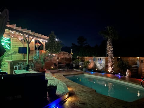 An evening of magical fun by pool and outdoor bar.