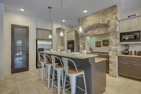 Fully equipped kitchen will make cooking meals here a fun experience.