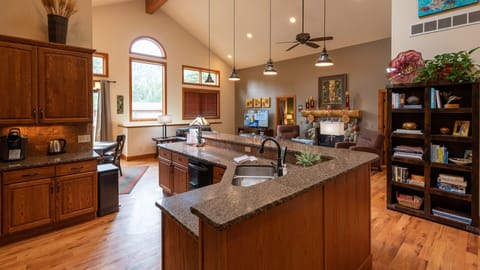Gorgeous kitchen extending into Great Room. Tons of cabinets, counters and space
