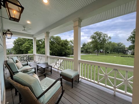 Comfy balcony for relaxing, having coffee. Gas lights, ceiling fans.