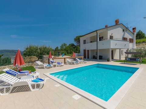 Sky, Building, Water, Property, Swimming Pool, Plant, Azure, House, Rectangle, Shade