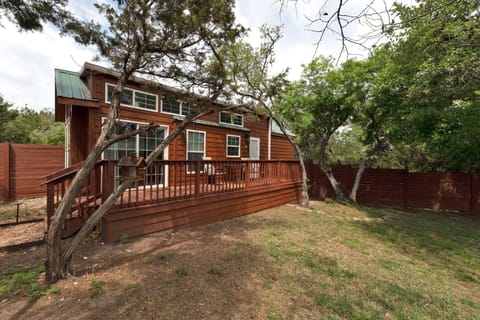 "The Longhorn" cabin features a private fenced yard and deck