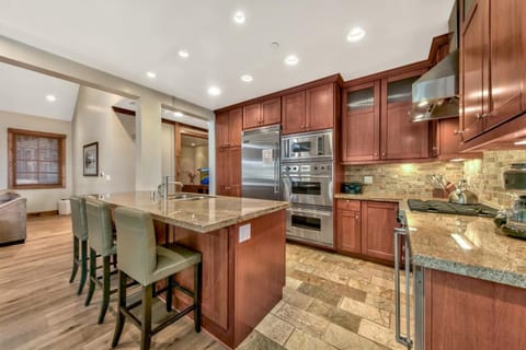 The granite counter tops and Viking Professional appliances throughout the kitchen would delight any chef.
