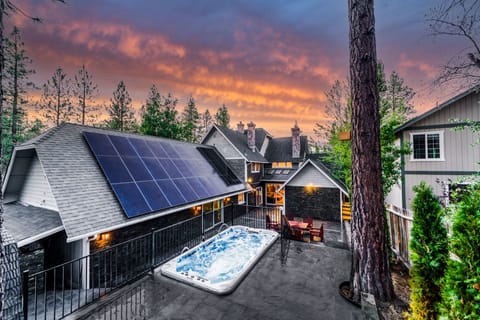 Relax in the spacious swimming Jacuzzi with sweeping views of Big Bear's evening skies.