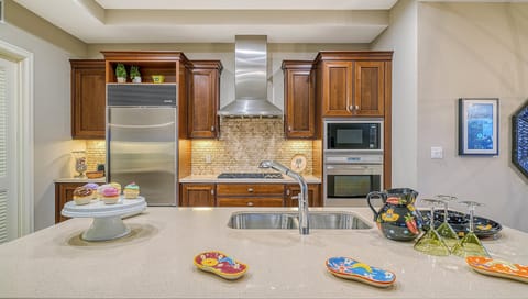 A cook's dream—gourmet appliances, sleek finishes, and everything you need to dine in style.