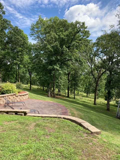 Old Bur oaks, birch, cherry and walnut fill the landscape.