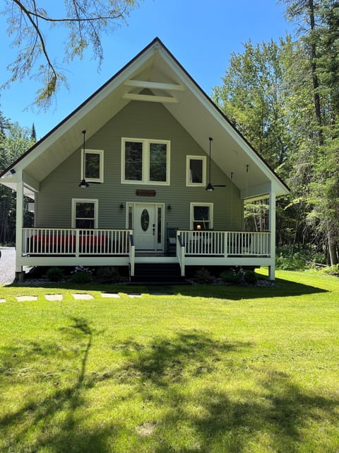 Front of home with large covered porch
