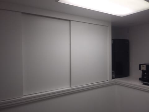 Pantry cabinets with dishes, utensils, cookware.