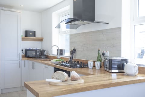 Kitchen with microwave and ample storage - Ocean View