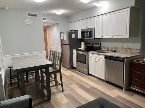 Stainless steel appliances with beautiful granite countertop