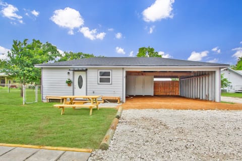 Front of home with covered parking.