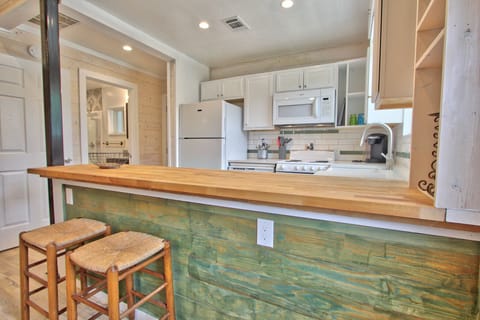 Kichen bar with seating.