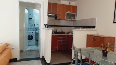 Full size kitchen shares it space with dining area