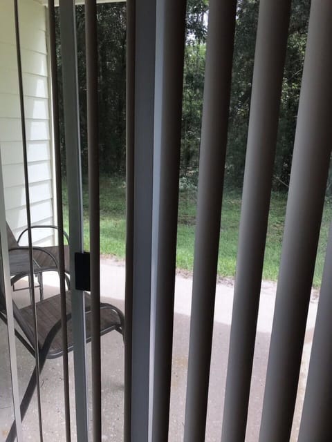 Walk out private patio facing woods.