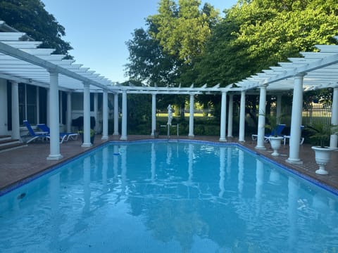 Huge pool out back. Lots of lounging options