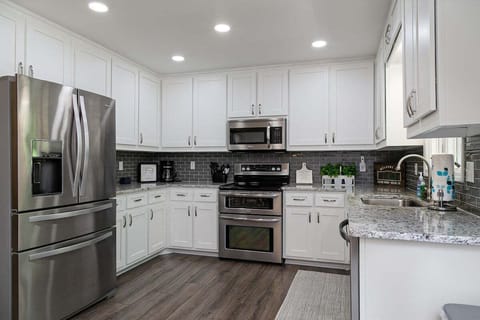Fully Equipped Kitchen with Granite Countertops