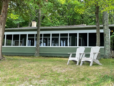 90' covered wrap around screen porch.