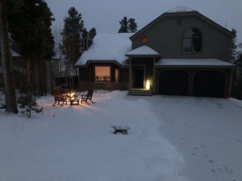 Sit around the fire pit and enjoy the winter wonderland environment.