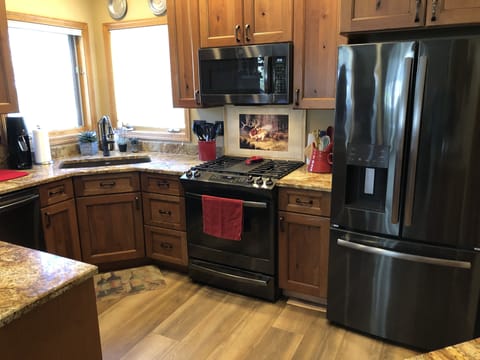 Granite counters, alder cabinets, toys: mixer, waffle iron, french press, Keurig