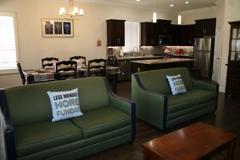 The living room sofas turn into full size sofa beds for extra sleeping space