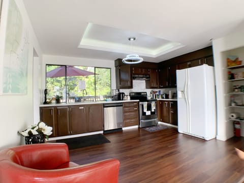 Open concept kitchen - fully equipped with coffee markers and spices