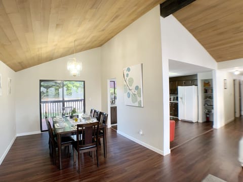 Open concept with wood vaulted ceiling