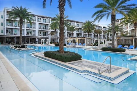 The resort style pool is seasonally heated and features private