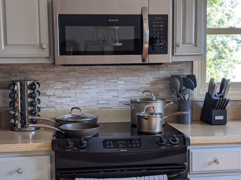 Pots, Pans, cooking utensils, spices, and oils, so you can cook your fav meals. 