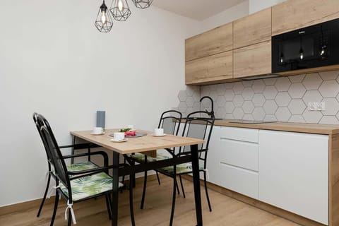 Fully equipped kitchenette with dining area.