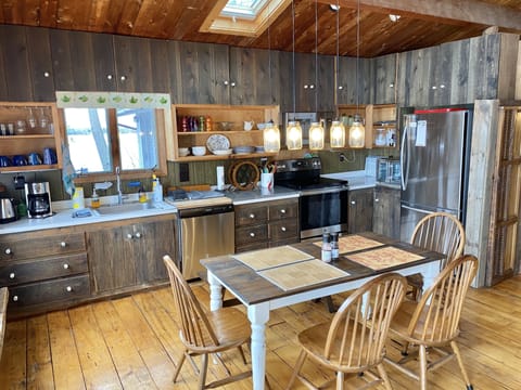 It features new appliances, dishes, silverware and basic cooking tools