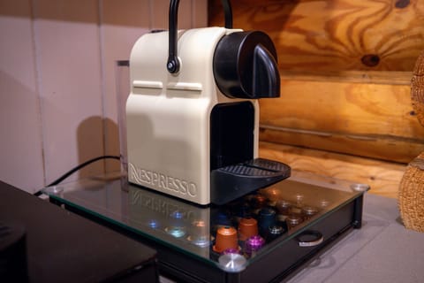 Start your morning right with a Nespresso brew — part of your fully stocked coffee & tea bar.