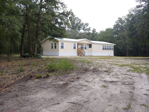 Entire home surrounded by beautiful woods where you often see deer etc.