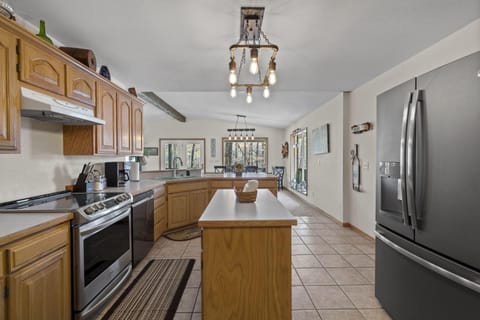 Kitchen Opens Into Main Level Living Space
