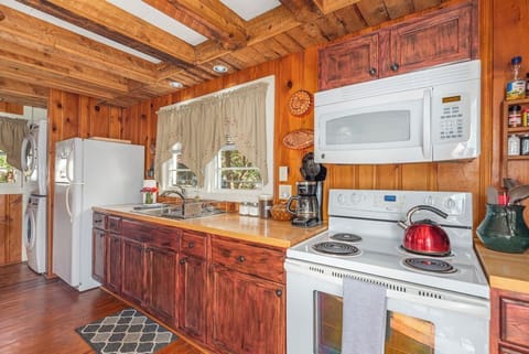 We have a drip coffee maker, ground coffee, and filters provided. 