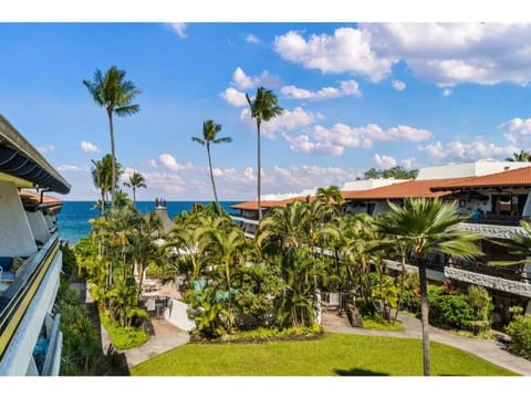 Take in the beauty of the courtyard and ocean from the comfort of your lanai